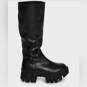 In the box, never been worn from Dolls Kill. Lyrica thigh high platform boots